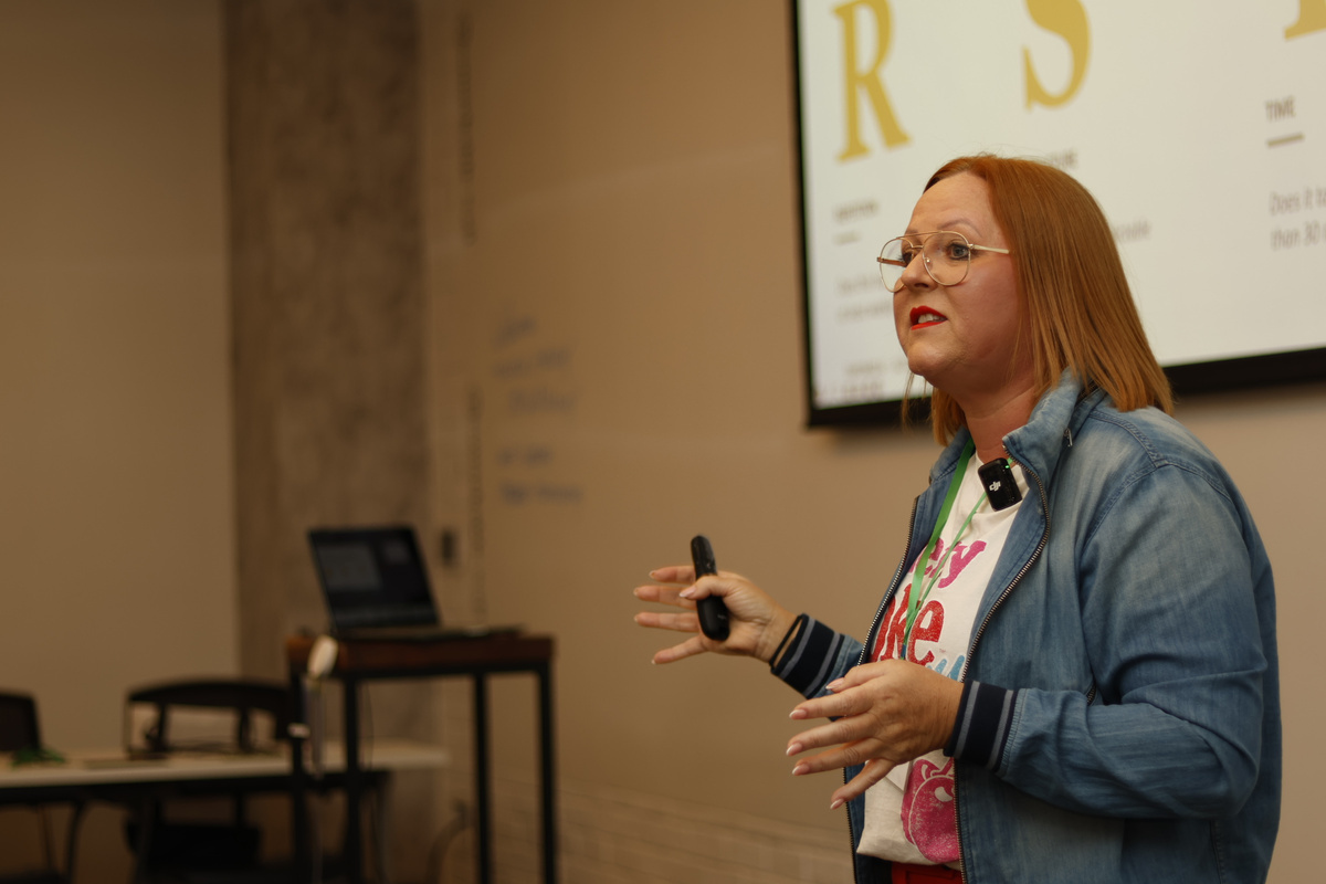 Zoë Walters delivering keynote on leadership transformation